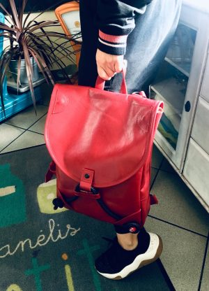 Italian Leather bag holding a man